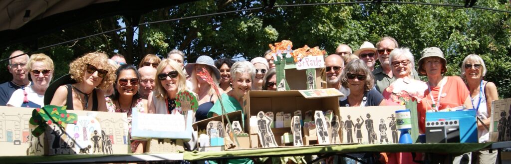 volunteers at the 5 year milestone event in July 2025